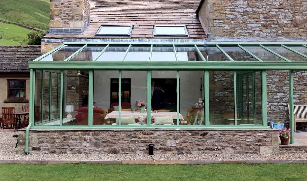 Sage green uPVC Lean-to conservatory